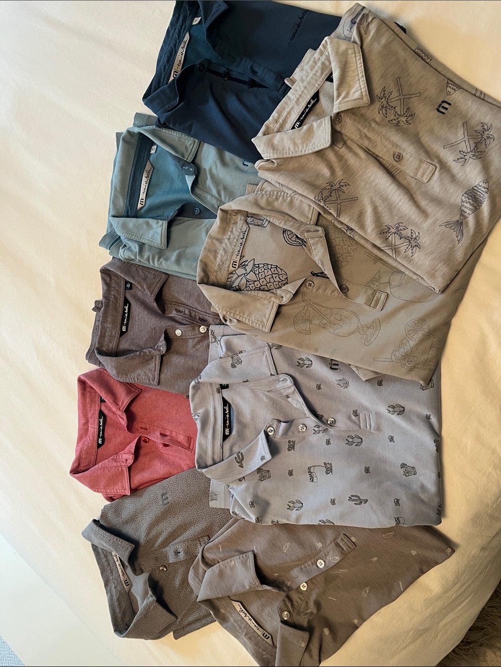 9 Travis Matthew’s golf shirts